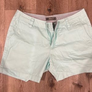 Mint green zipper shorts with pockets